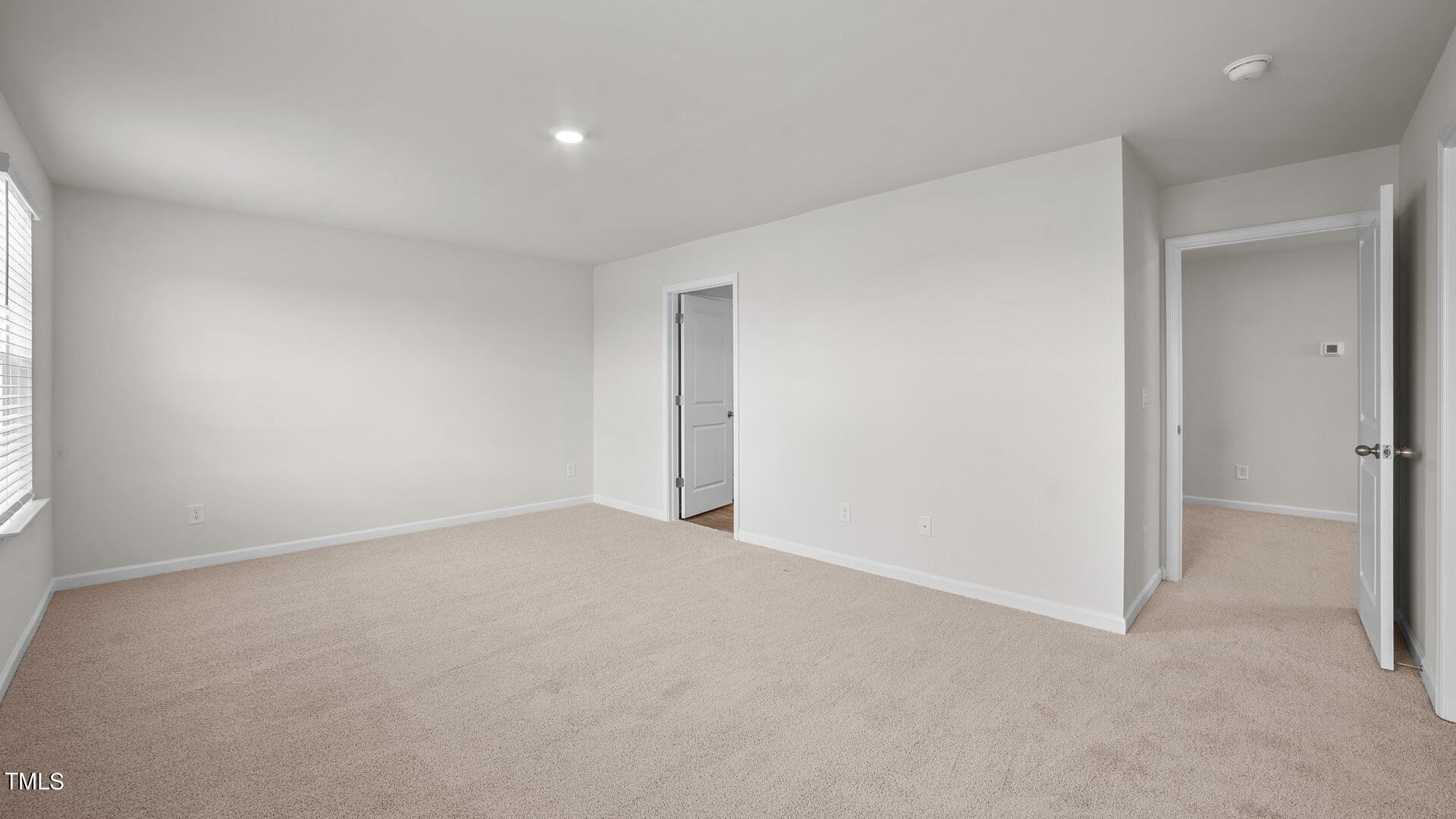 210 River Bank Road Fuquay-Varina, NC 27526 - Photo 23 of 36 an empty room with an entryway