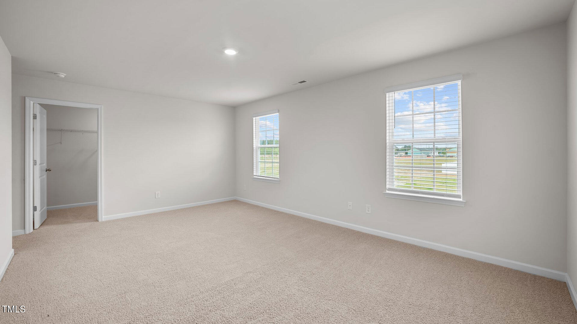 210 River Bank Road Fuquay-Varina, NC 27526 - Photo 24 of 36 a view of an empty room with a window