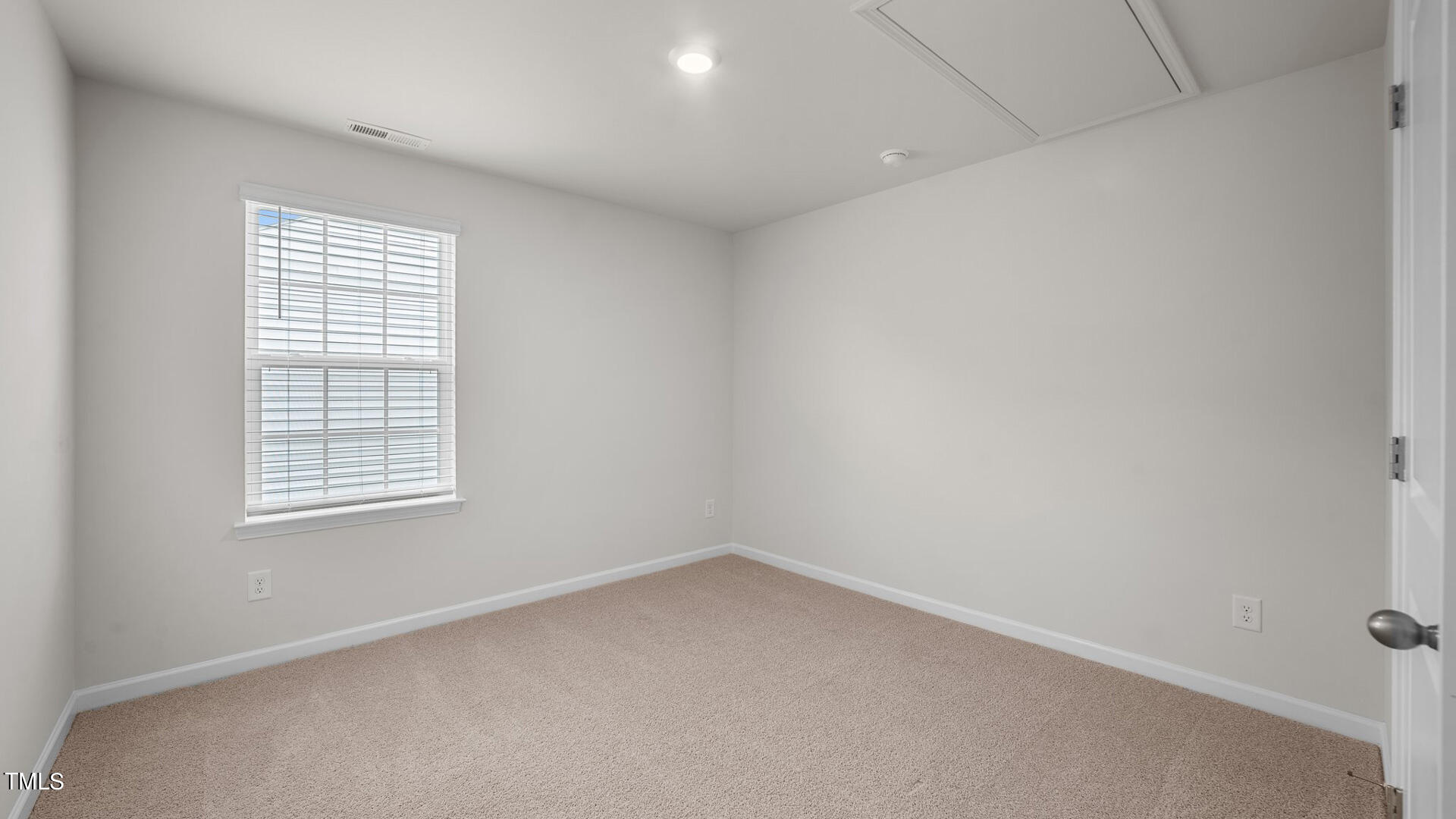 210 River Bank Road Fuquay-Varina, NC 27526 - Photo 28 of 36 an empty room with a window