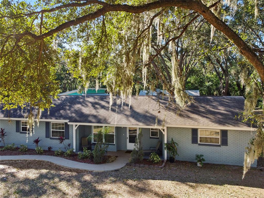 9628 Davis Road Tampa, FL 33637 - Photo 41 of 44 a view of a house with a backyard