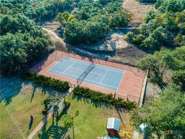a view of a garden with a lake