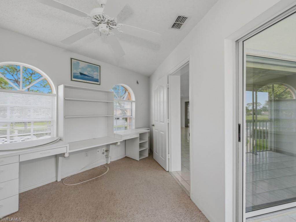 565 Augusta Boulevard, Unit 10 Naples, FL 34113 - Photo 13 of 16 a room with walk in closet and a window