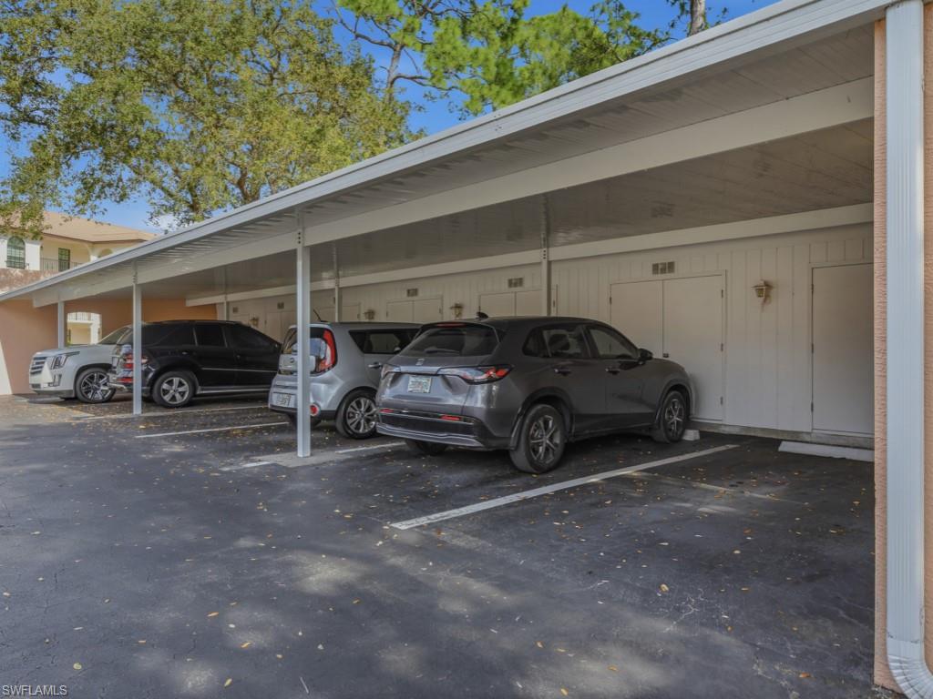 565 Augusta Boulevard, Unit 10 Naples, FL 34113 - Photo 16 of 16 a view of a cars parking space