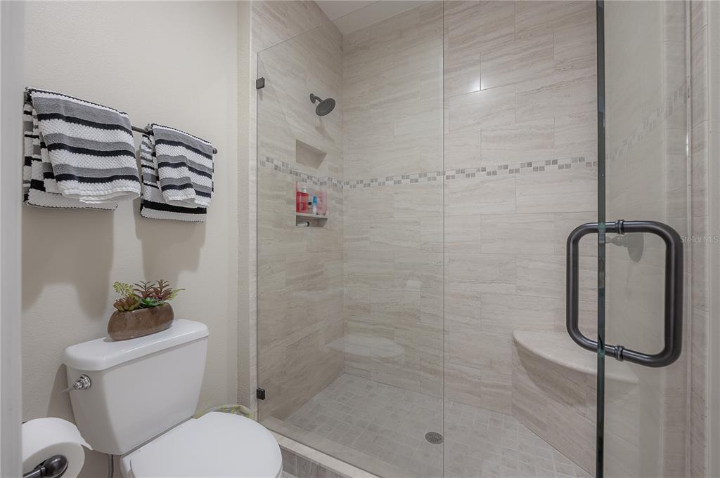 3108 West Villa Rosa Street Tampa, FL 33611 - Photo 43 of 58 a bathroom with a shower and a toilet