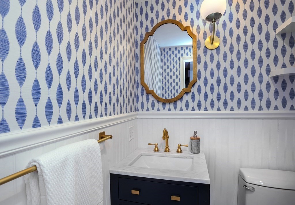 11 Rustlewood Road Boston, MA 02132 - Photo 13 of 31 a bathroom with a sink and a mirror