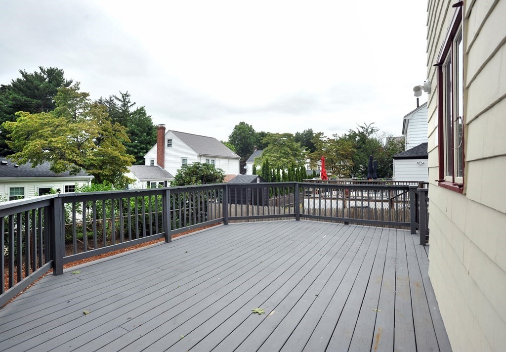 11 Rustlewood Road Boston, MA 02132 - Photo 22 of 31 a view of a balcony with wooden floor