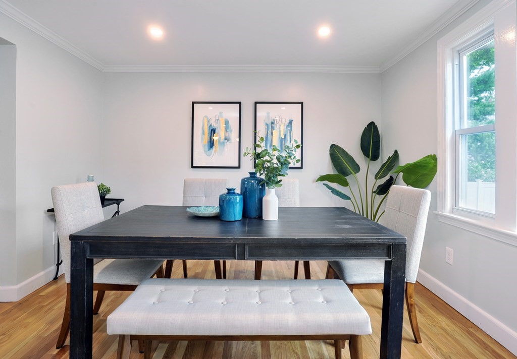 11 Rustlewood Road Boston, MA 02132 - Photo 7 of 31 a view of a dining room with furniture window and wooden floor