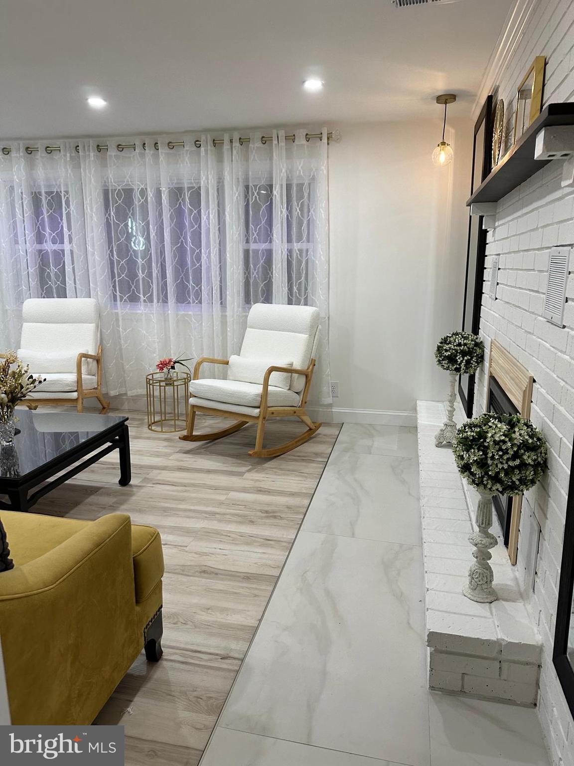 325 Wilson Road Blackwood, NJ 08012 - Photo 11 of 33 a living room with furniture and a potted plant