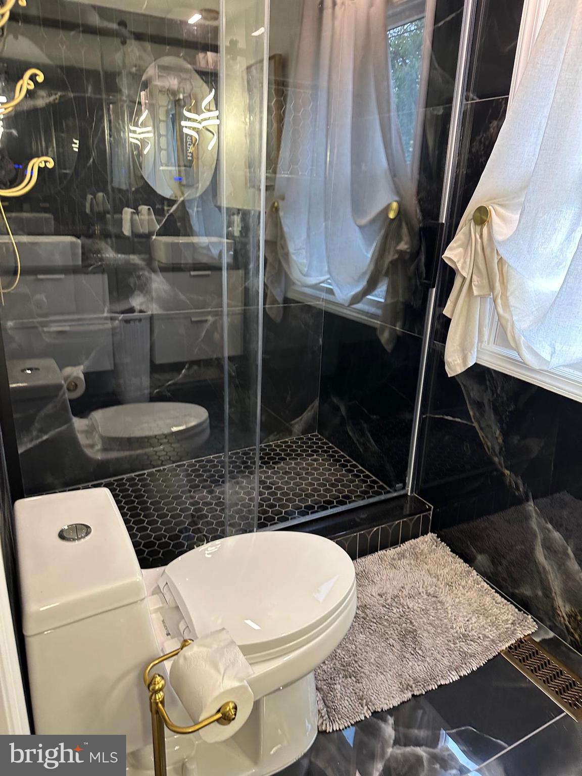 325 Wilson Road Blackwood, NJ 08012 - Photo 22 of 33 a bathroom with a toilet and a mirror