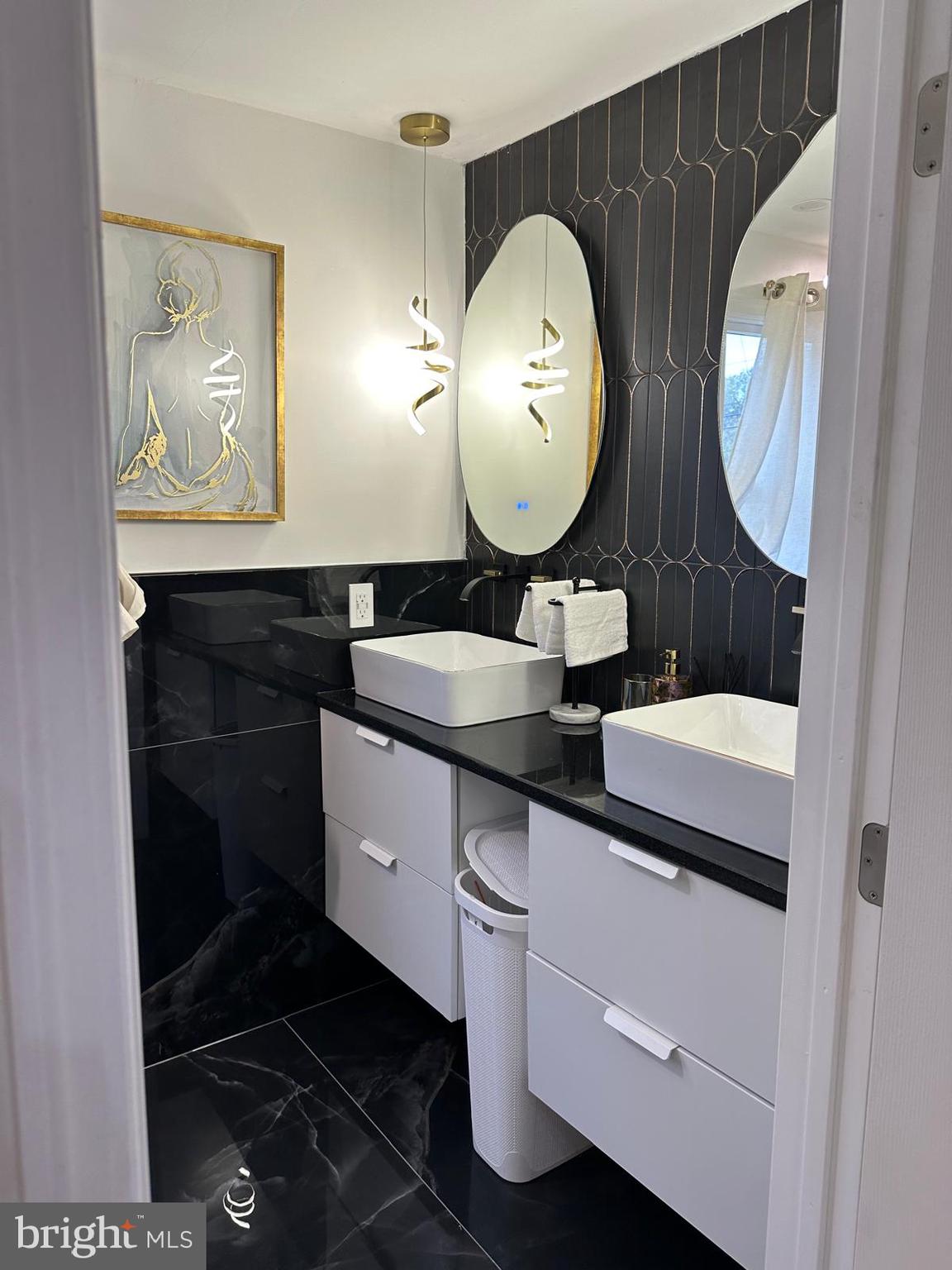 325 Wilson Road Blackwood, NJ 08012 - Photo 23 of 33 a bathroom with a double vanity sink and a mirror