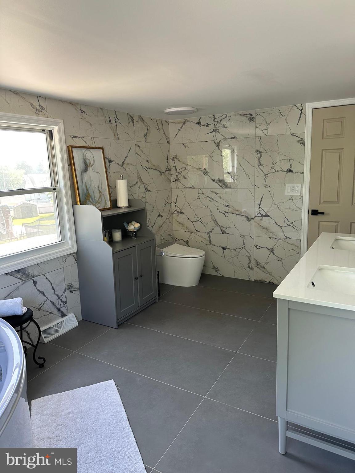 325 Wilson Road Blackwood, NJ 08012 - Photo 25 of 33 a bathroom with a sink toilet and window