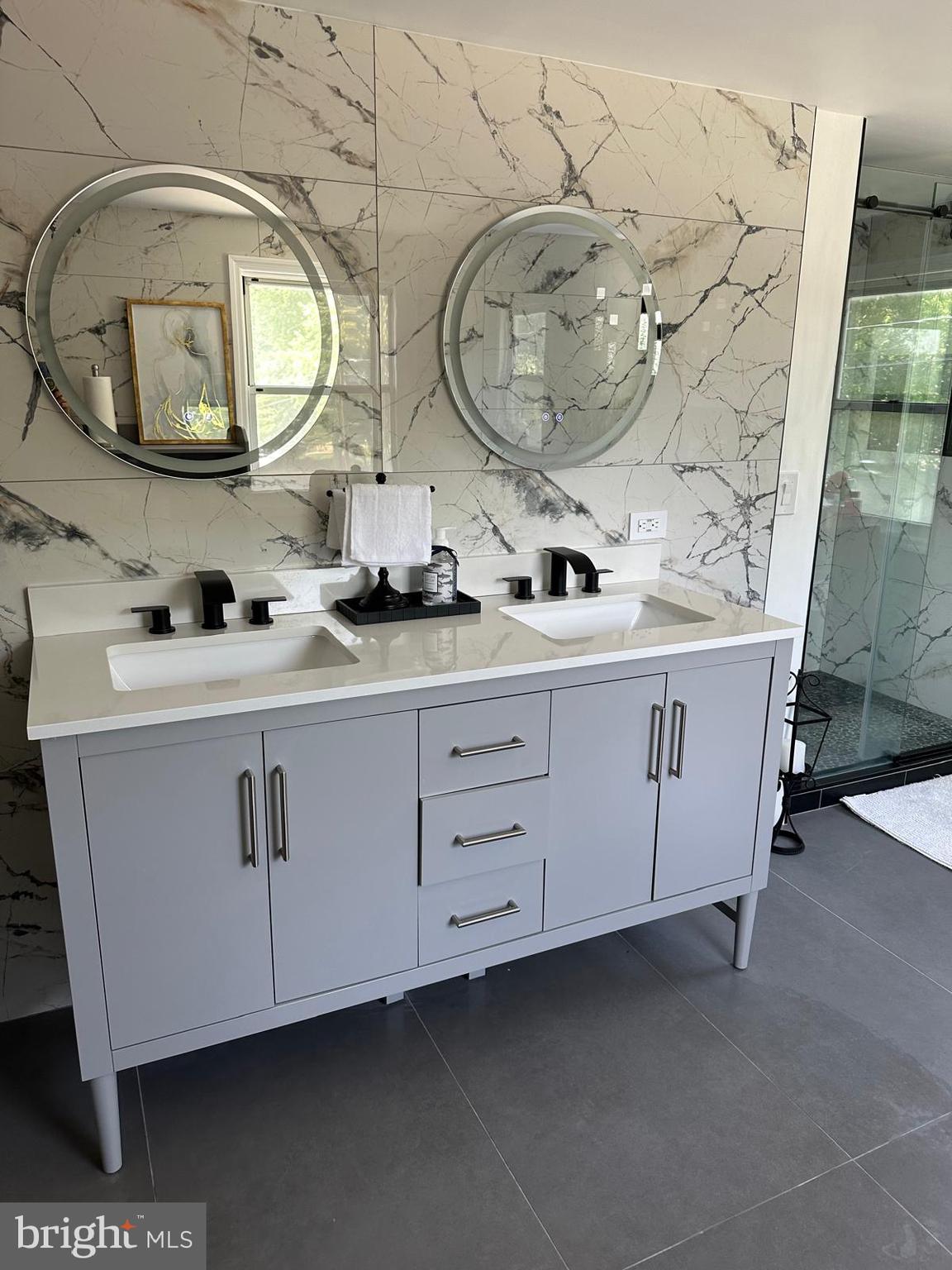 325 Wilson Road Blackwood, NJ 08012 - Photo 27 of 33 a bathroom with a sink and a mirror