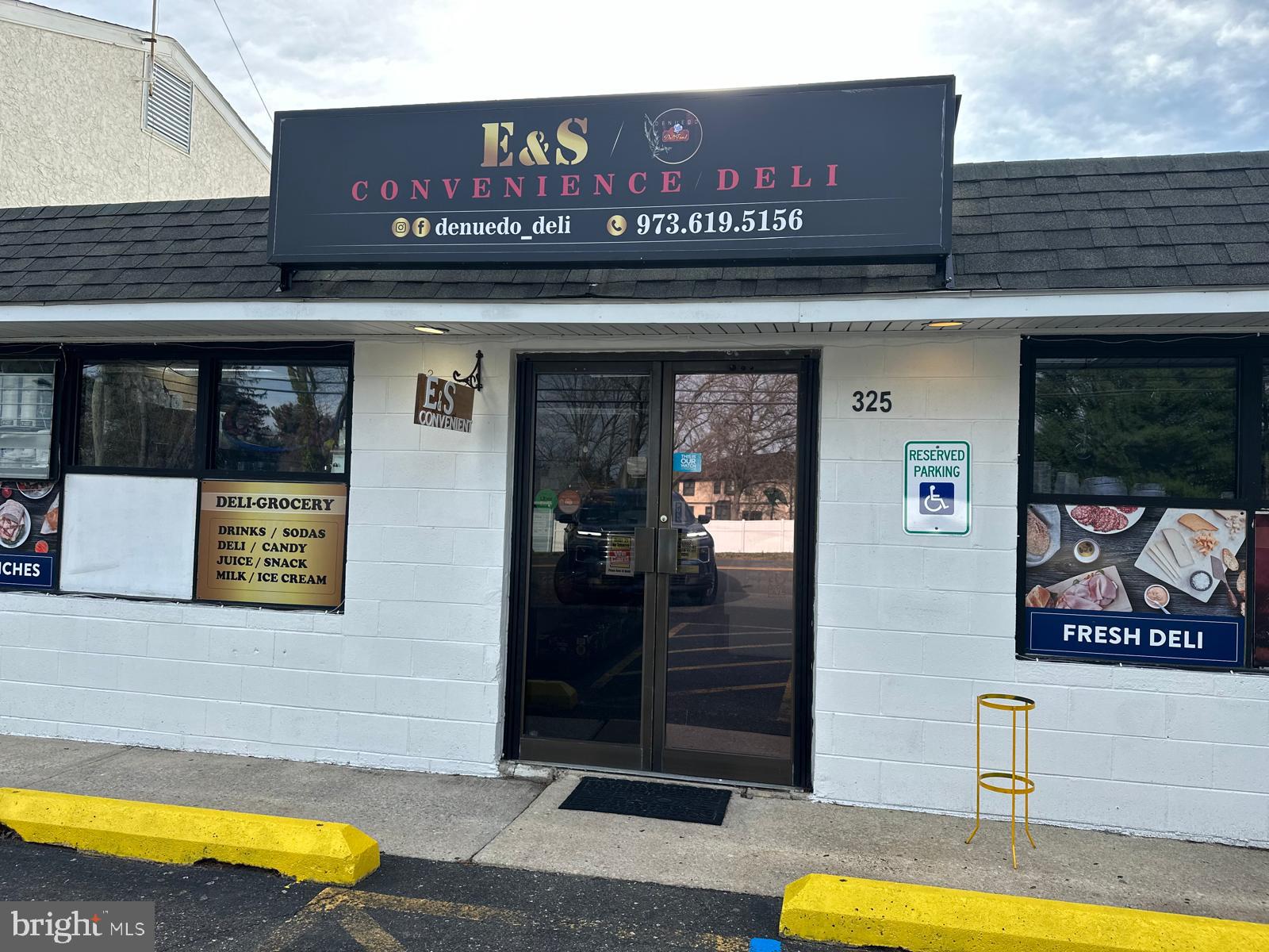 325 Wilson Road Blackwood, NJ 08012 - Photo 4 of 33 a view of a shop with brick wall and a building