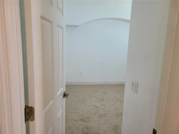 a view of a room with a window