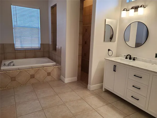 a view of livingroom with hardwood floor and hallway