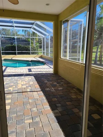 a view of a golf course with an ocean
