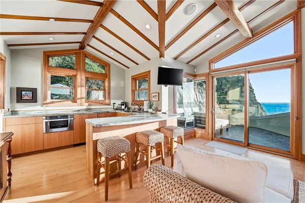 a very nice looking living room with a large window