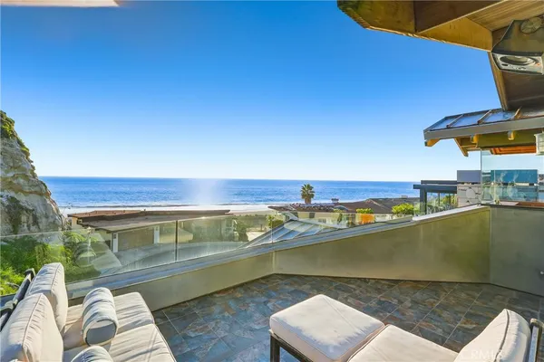 a view of a ocean from a balcony