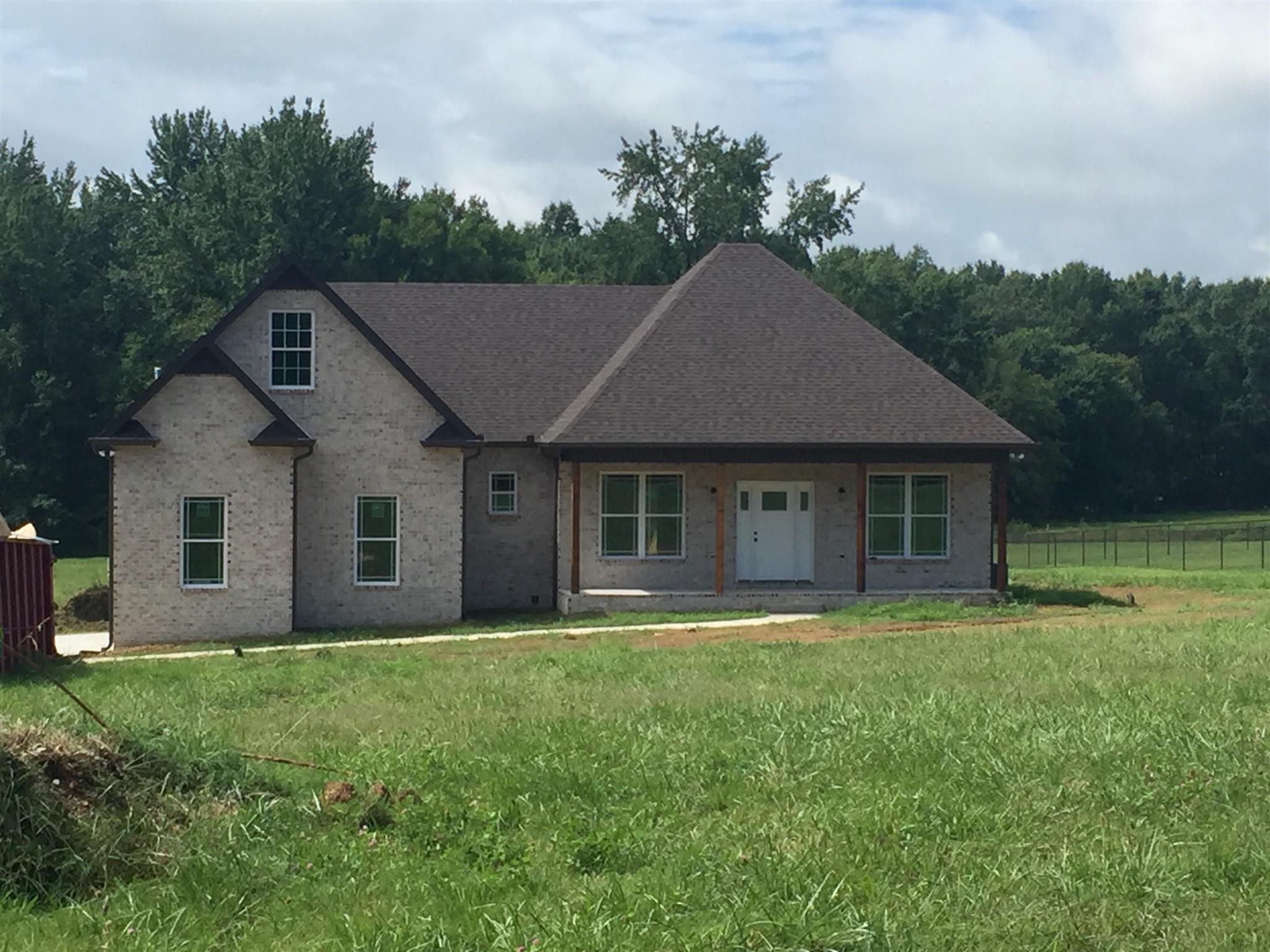 515 Tom Link Road Cottontown, TN 37048 - Photo 1 of 11 Will have wood shutters to match posts.