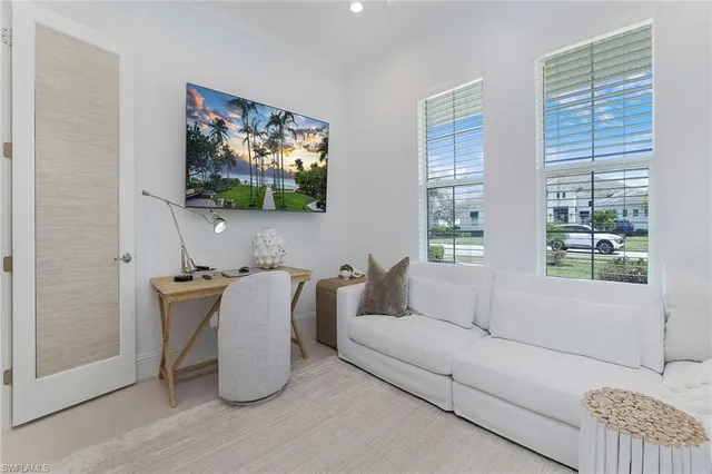 a bathroom with a toilet sink vanity granite and shower