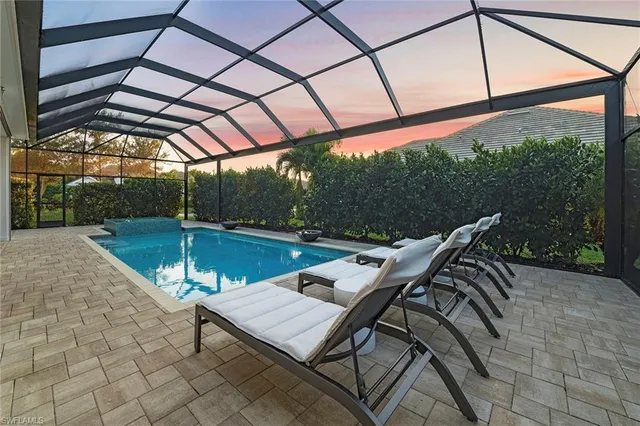 a patio with table and chairs