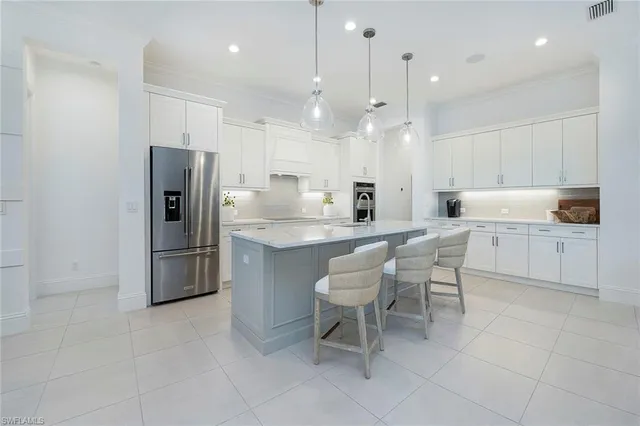 a large kitchen with cabinets