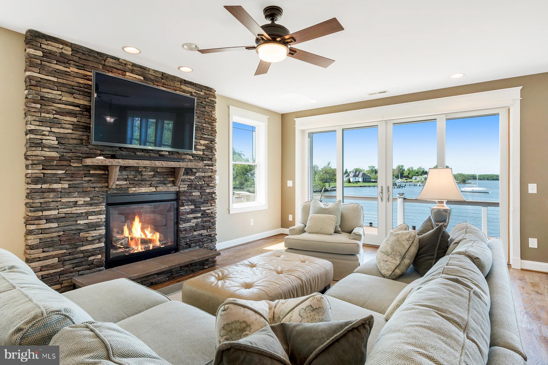 1215 Rogers Road Edgewater, MD 21037 - Photo 6 of 51 Fire and water views from the seating area
