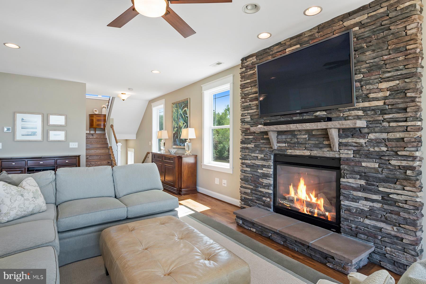 1215 Rogers Road Edgewater, MD 21037 - Photo 7 of 51 Stone-surround fireplace in the great room