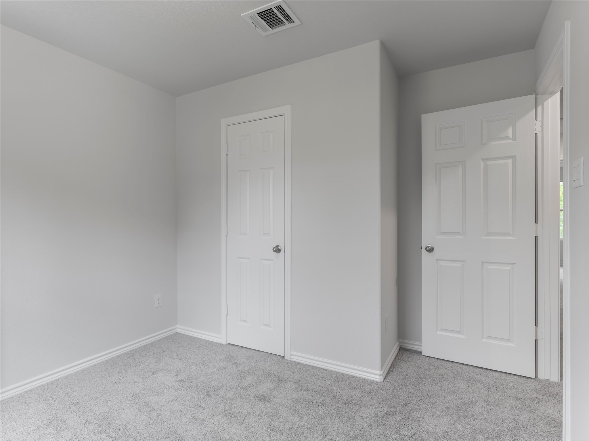 306 North Orange Street Sweeny, TX 77480 - Photo 24 of 30 A cozy upstairs bedroom featuring plush carpeting.