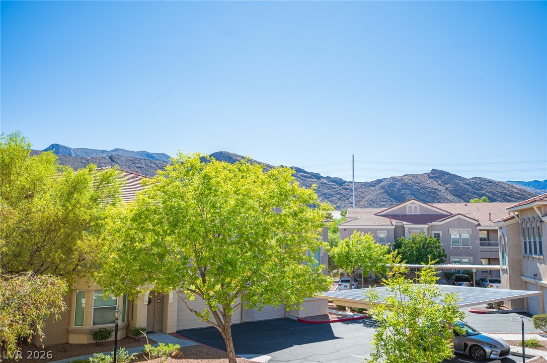 10550 West Alexander Road, Unit 2014 Las Vegas, NV 89129 - Photo 36 of 43 Rugged mountain peaks form a dramatic backdrop for the surrounding residential community.