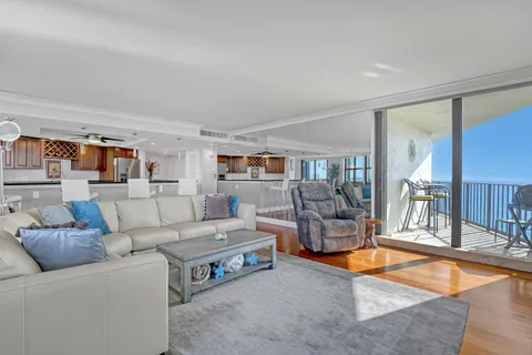a view of a patio with a table and chairs