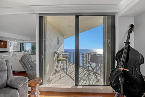 a view of a house with outdoor space and sitting area