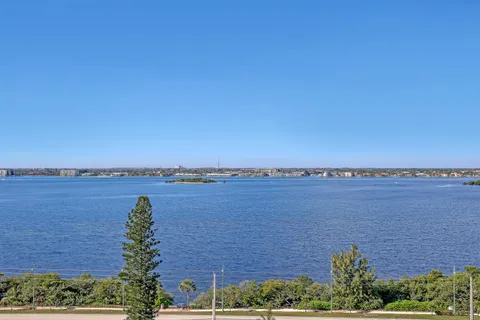 a view of yard with swimming pool and outdoor seating