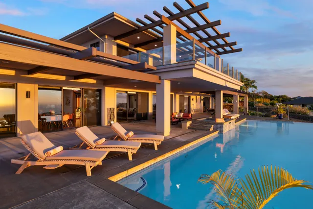 a view of a swimming pool with a terrace