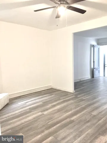 a kitchen with granite countertop cabinets stainless steel appliances and a sink