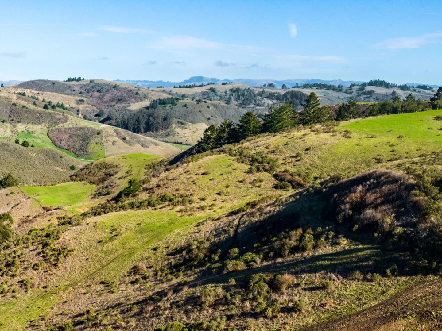 3225 Pomponio Creek Road San Gregorio, CA 94074 - Photo 34 of 50 a view of a mountain with a lake
