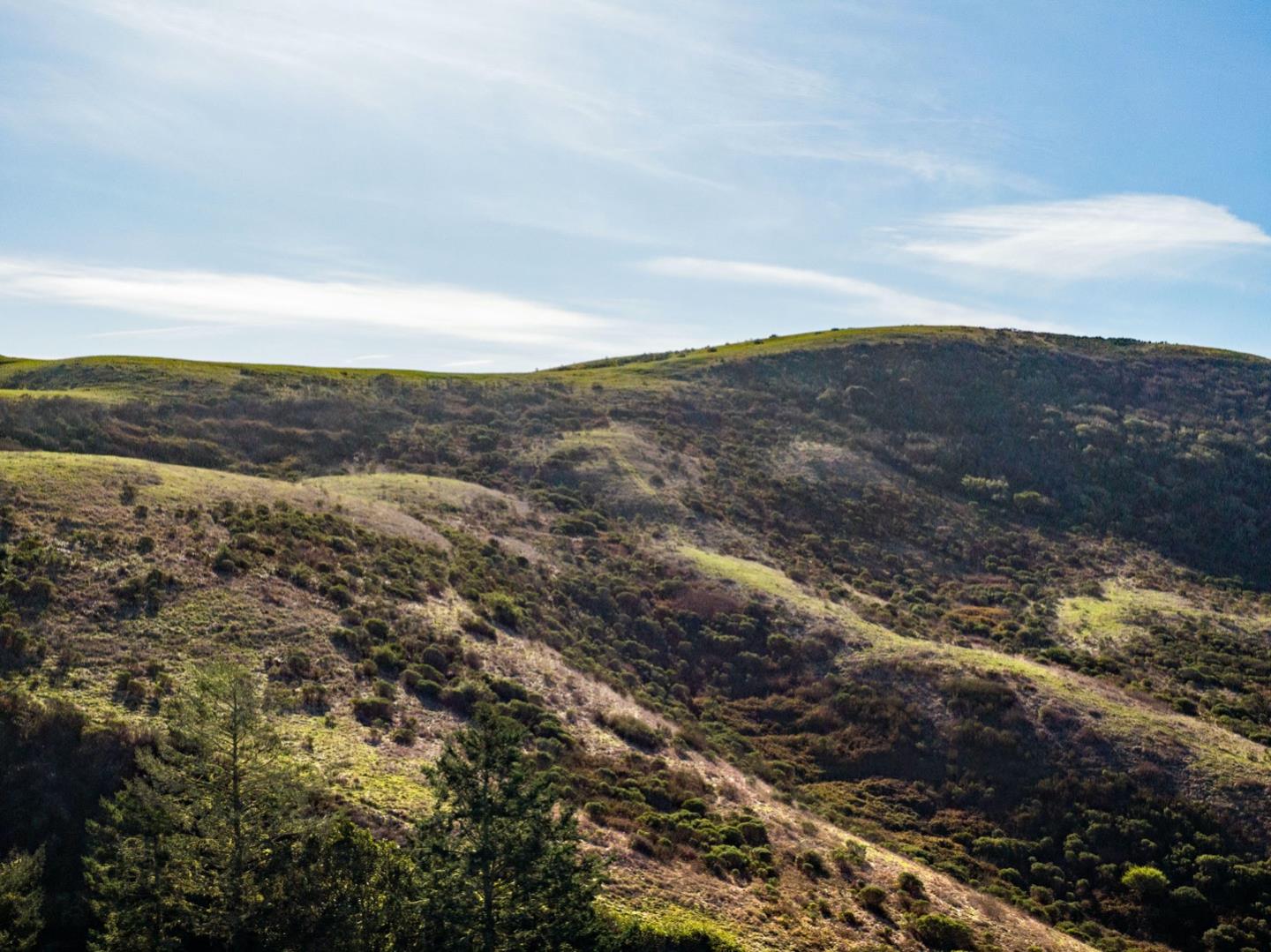 3225 Pomponio Creek Road San Gregorio, CA 94074 - Photo 39 of 50 a view of a mountain with mountains in the background