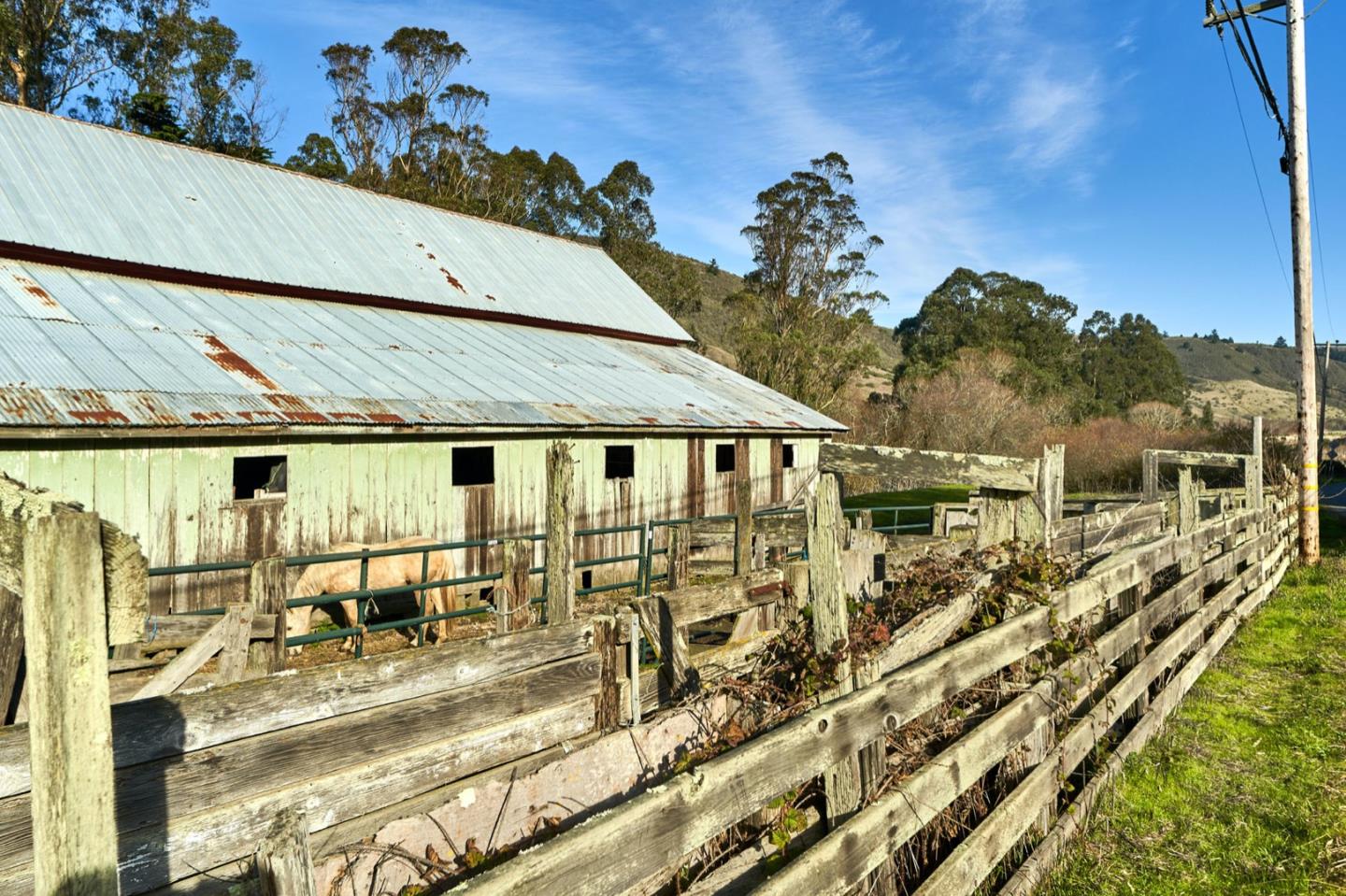 3225 Pomponio Creek Road San Gregorio, CA 94074 - Photo 5 of 50 a view of a house with a large windows