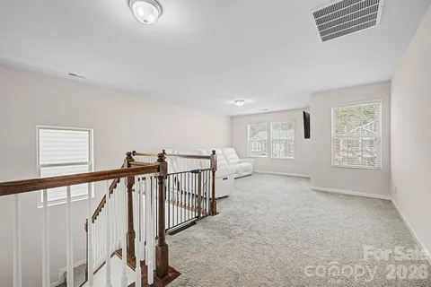 a view of livingroom with furniture and stairs