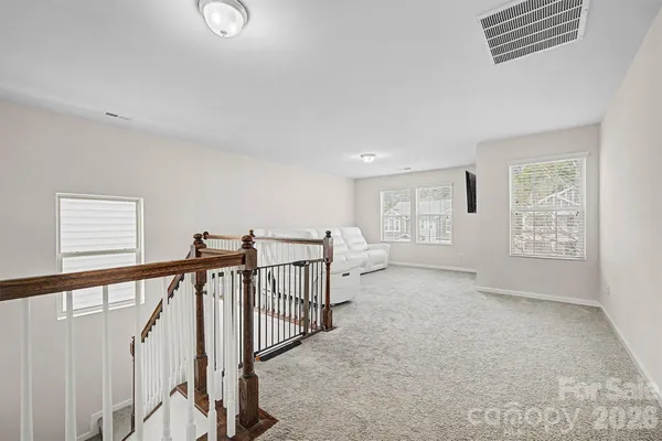 a view of livingroom with furniture and stairs