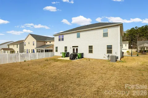 a view of a house with a patio