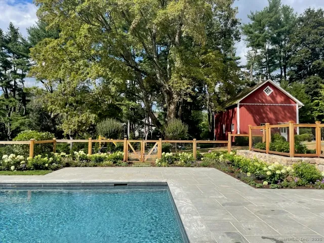 a view of house with outdoor space