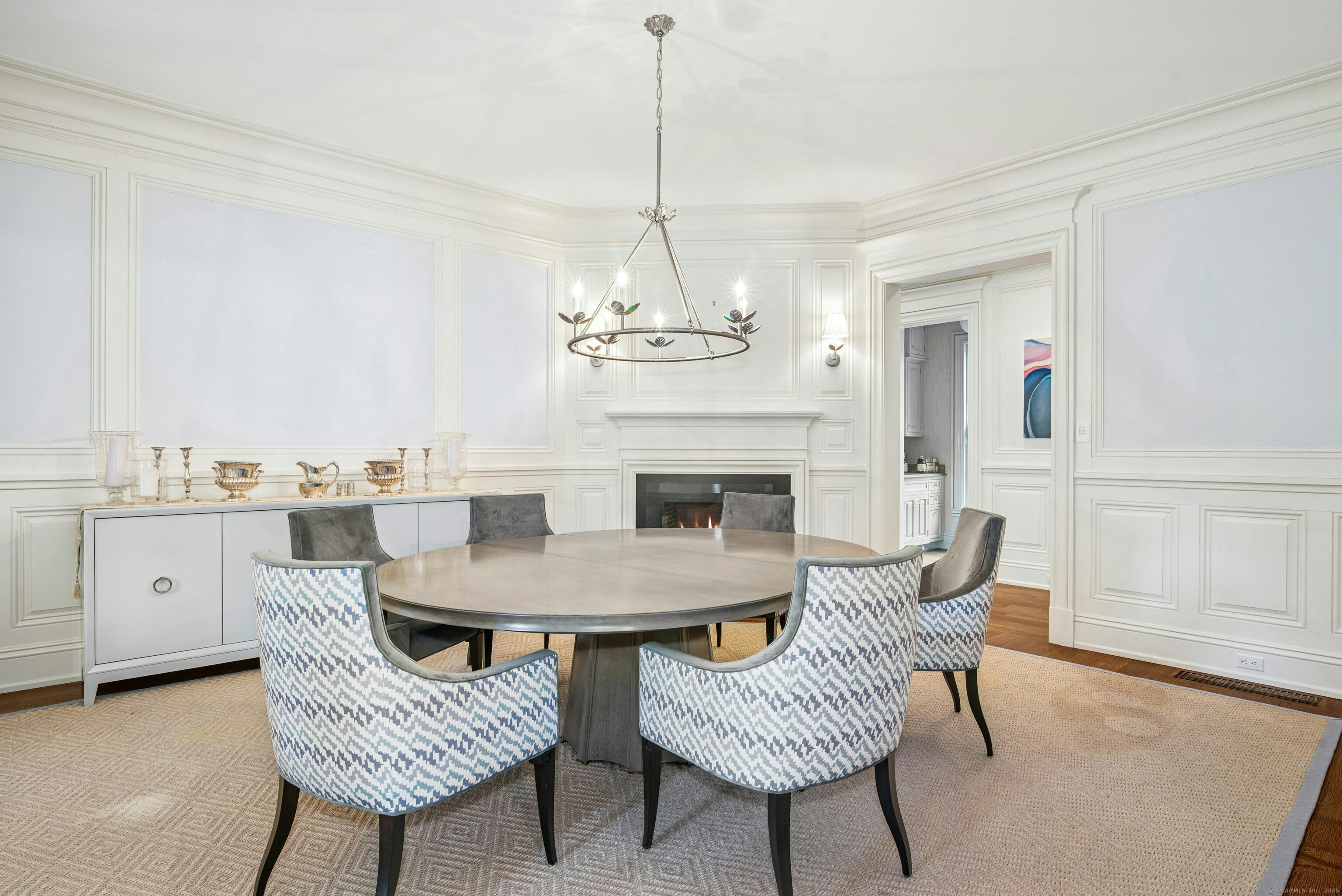 584 West Road New Canaan, CT 06840 - Photo 7 of 33 The warm and sophisticated dining room with fireplace is perfect for entertaining