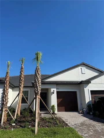 a front view of a house with porch
