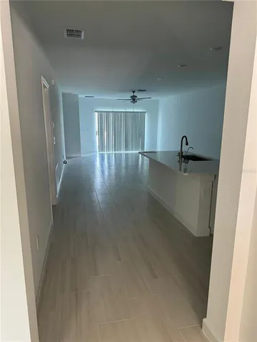 a view of a livingroom with a staircase