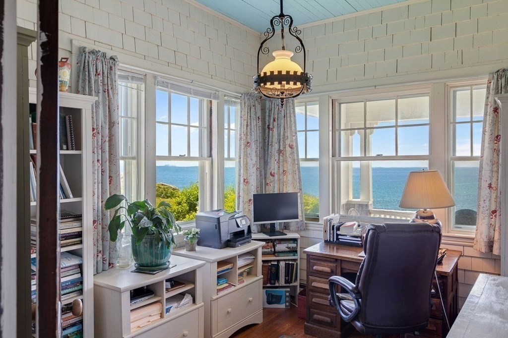 7 Bass Rocks Road Gloucester, MA 01930 - Photo 15 of 36 a view of a workspace with furniture and a window