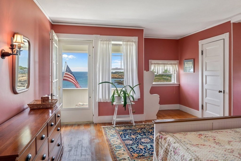 7 Bass Rocks Road Gloucester, MA 01930 - Photo 17 of 36 a living room with furniture and wooden floor