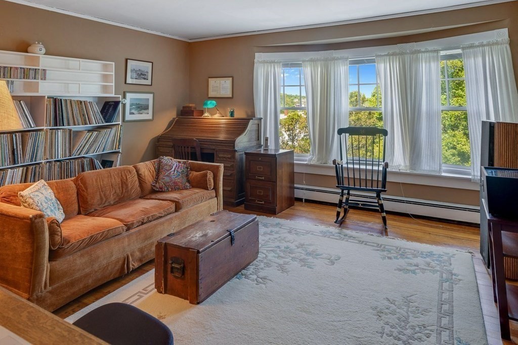 7 Bass Rocks Road Gloucester, MA 01930 - Photo 21 of 36 a living room with furniture and a window
