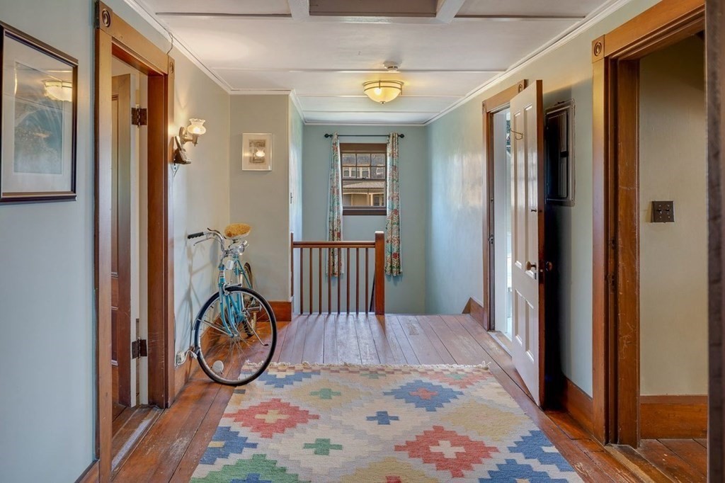 7 Bass Rocks Road Gloucester, MA 01930 - Photo 28 of 36 a view of a hallway and wooden floor