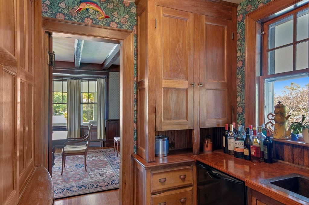 7 Bass Rocks Road Gloucester, MA 01930 - Photo 8 of 36 view of living room with furniture and floor to ceiling window